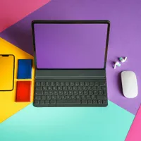 person with glasses using computer
